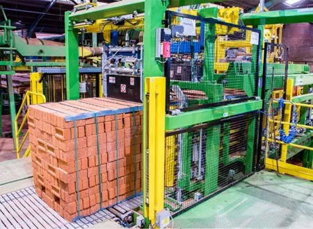 Clay bricks – automatic strapping system - PET straps coils that weigh up to 75kgs